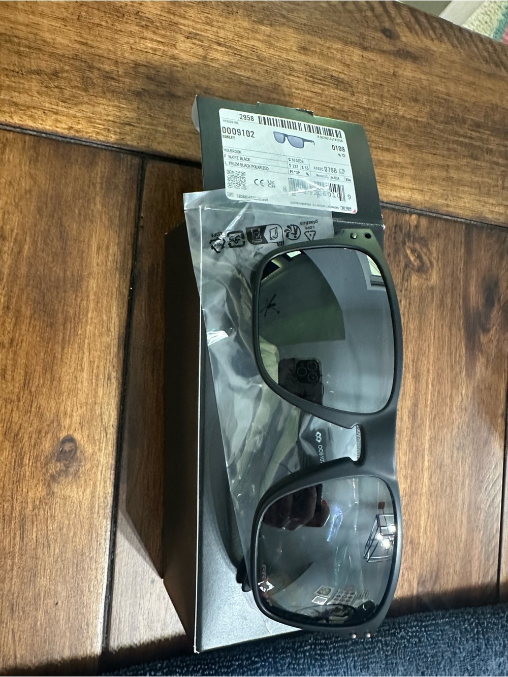 Oakley Holbrook Matte Black Sunglasses with Gray Lenses - small defect (see pic)